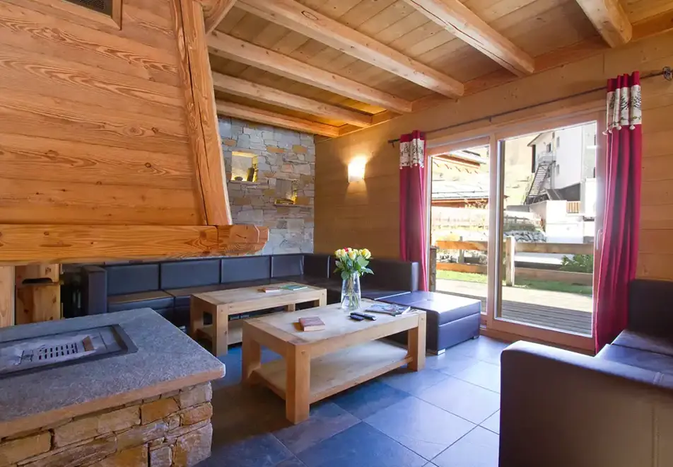 Lodge, Les Deux Alpes (self catered chalet) - Living area with fireplace